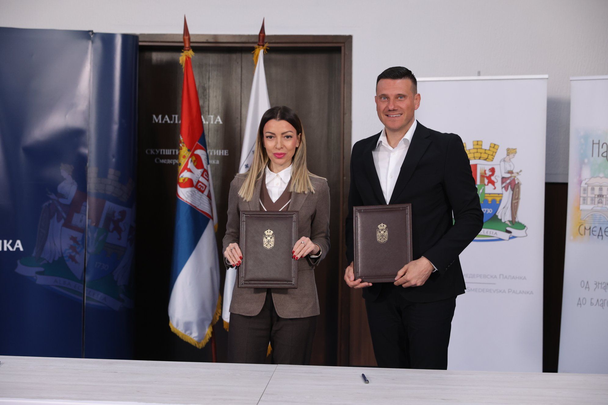 ПОТПИСАНА ДВА ЗНАЧАЈНА УГОВОРА ЗА ИНФРАСТРУКТУРНЕ ПРОЈЕКТЕ У СМЕДЕРЕВСКОЈ ПАЛАНЦИ